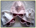 pink sun goggles and hats for babies